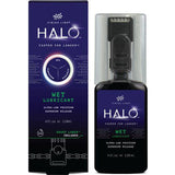 Finish Line Halo Wet Lubricant for bicycle chains with Smart Luber™ in a workshop setting, showing the lubricant bottle and chain.