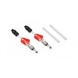 Jagwire DOT brake assembly bleed fitting and hose clamp for workshop use, showing metal fittings and attached brake hose.