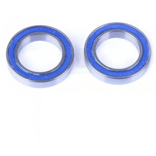 Wheels Manufacturing BB90 ABEC-3 bearings for Trek 24mm crank bottom bracket, close-up of metal bearings in packaging.