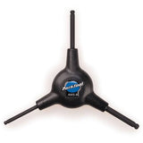 Park Tool AWS-8 ball driver hex wrench set with 4mm, 5mm, and 6mm ergonomic workshop tools, shown in a workshop setting.
