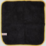 Gtechniq Bike Drying Towel in workshop setting, ultra-absorbent microfiber for scratch-free motorcycle drying.