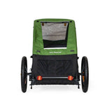 Burley Tail Wagon pet trailer with safety flag, foldable bike-only carrier for transporting small pets comfortably and securely.