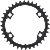 Shimano Ultegra FC-R8000 36T 11-speed inner chainring for road bikes, close-up of black metal component with teeth and branding