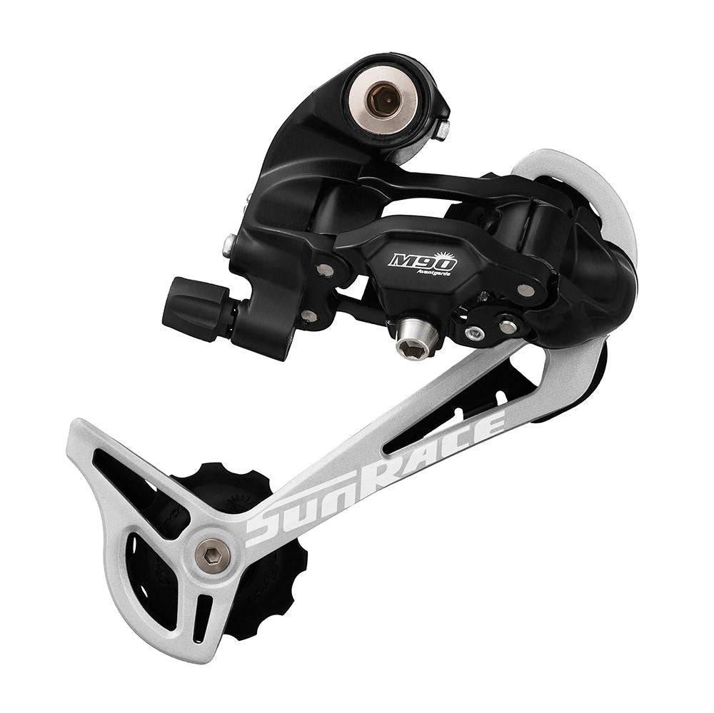 SunRace RDM97 LDB 9-speed mountain bike rear derailleur with long cage, mounted on a bike frame, showcasing gear compatibility.