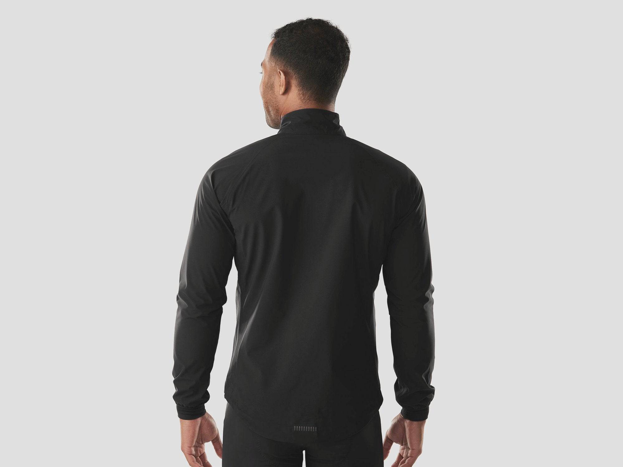 Trek Circuit Rain Cycling Jacket in waterproof, breathable fabric, shown folded and ready for all-weather riding.