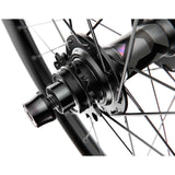 DT Swiss D 1900 26-inch rear wheel with 30mm rim, tubeless ready, single speed axle, suitable for mountain bikes.