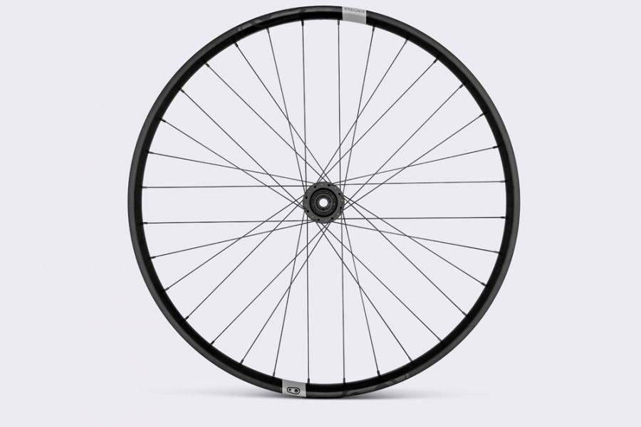 Crank Brothers Synthesis Alloy Enduro rear mountain bike wheel with CB hub, showcasing spokes and rim design.