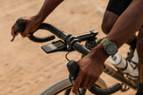 Coros DURA Solar GPS bike computer with 120-hour battery, dual-frequency GPS, and navigation features, shown in the image.
