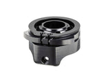 Black Trek Fetch+ 4 front steering disc bike component with cargo box and steering mechanism for bike navigation and control.