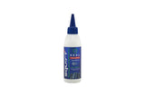 Squirt SEAL Tyre Sealant with BeadBlock for puncture protection on tubed and tubeless wheels, shown in a workshop setting.