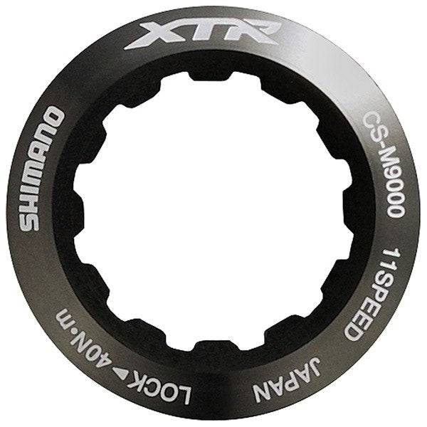 Shimano CS-M9000 lock-ring and spacer for cassette installation, genuine Shimano spares components for bike gear setup.