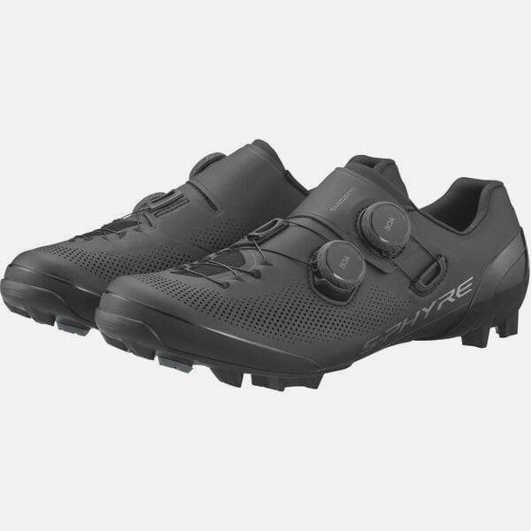Shimano S-PHYRE XC9 MTB shoes for cross-country cycling, showing black and red racing cleats and breathable upper design.