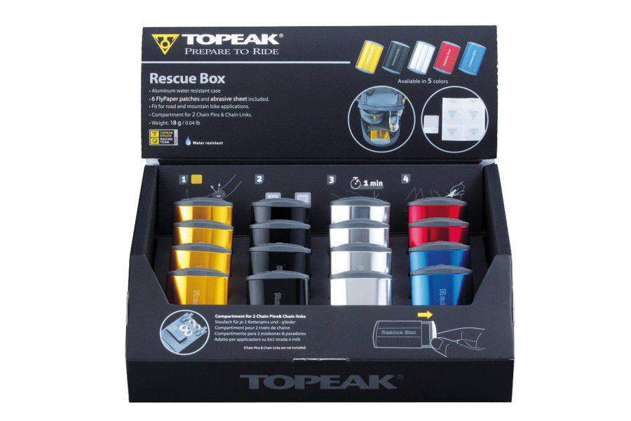 Topeak Rescue Box countertop display with 16 black water-resistant aluminium repair boxes for workshop organization.