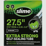 Slime Smart Tube inner tube for 27.5-inch bikes, featuring Schrader valve and sealant for puncture protection.