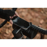 Topeak Omni Ridecase II bike phone mount with stem multi-mount, black, securely holds a smartphone on a bicycle handlebar.