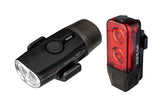 Topeak Powerlux USB rechargeable bike light combo with front Headlux 100 and rear Taillux 25 in black, mounted on a bike.