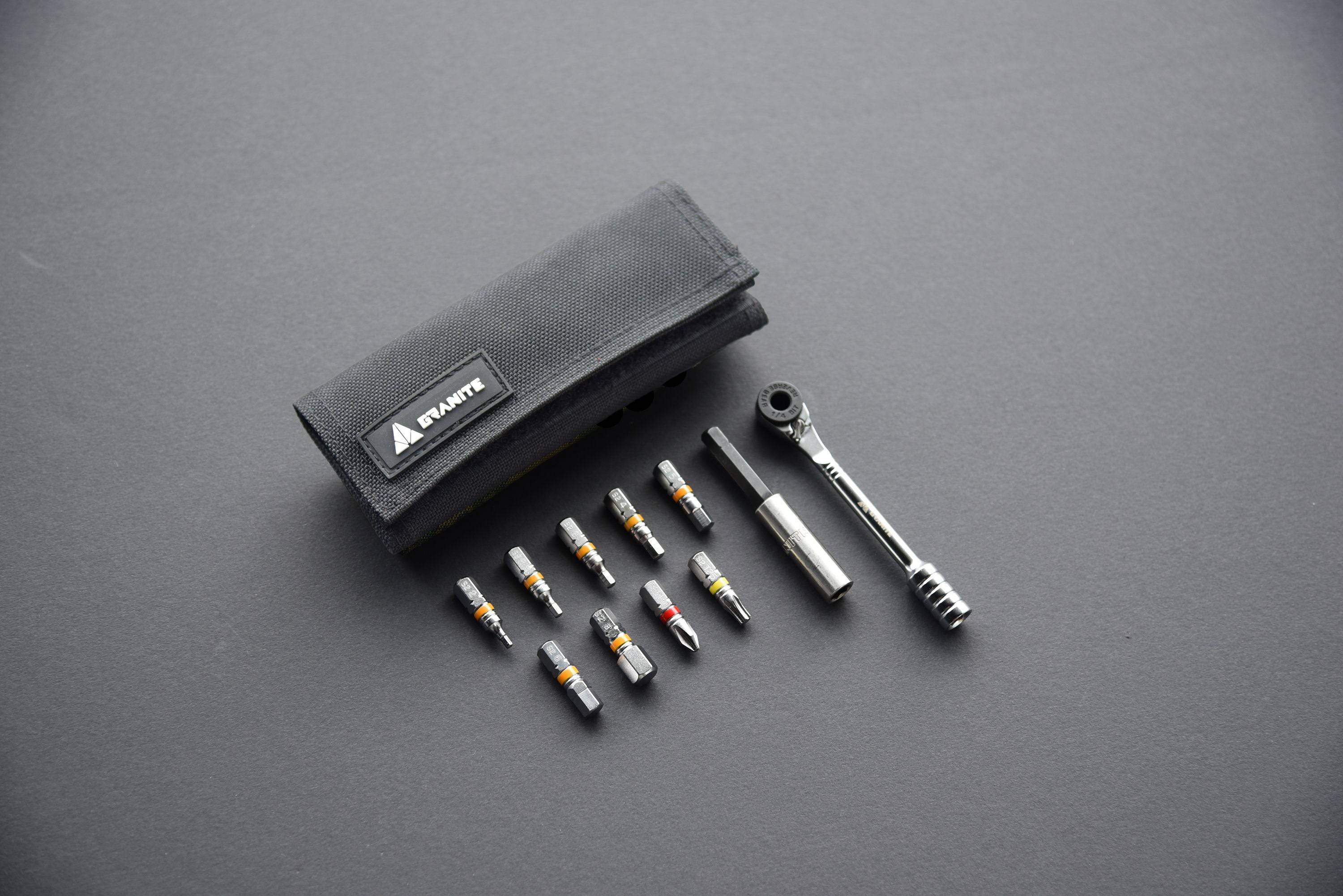 Granite ROCKnROLL workshop tool kit with Cordura fabric roll and S2 alloy steel bits, organized for DIY and professional use