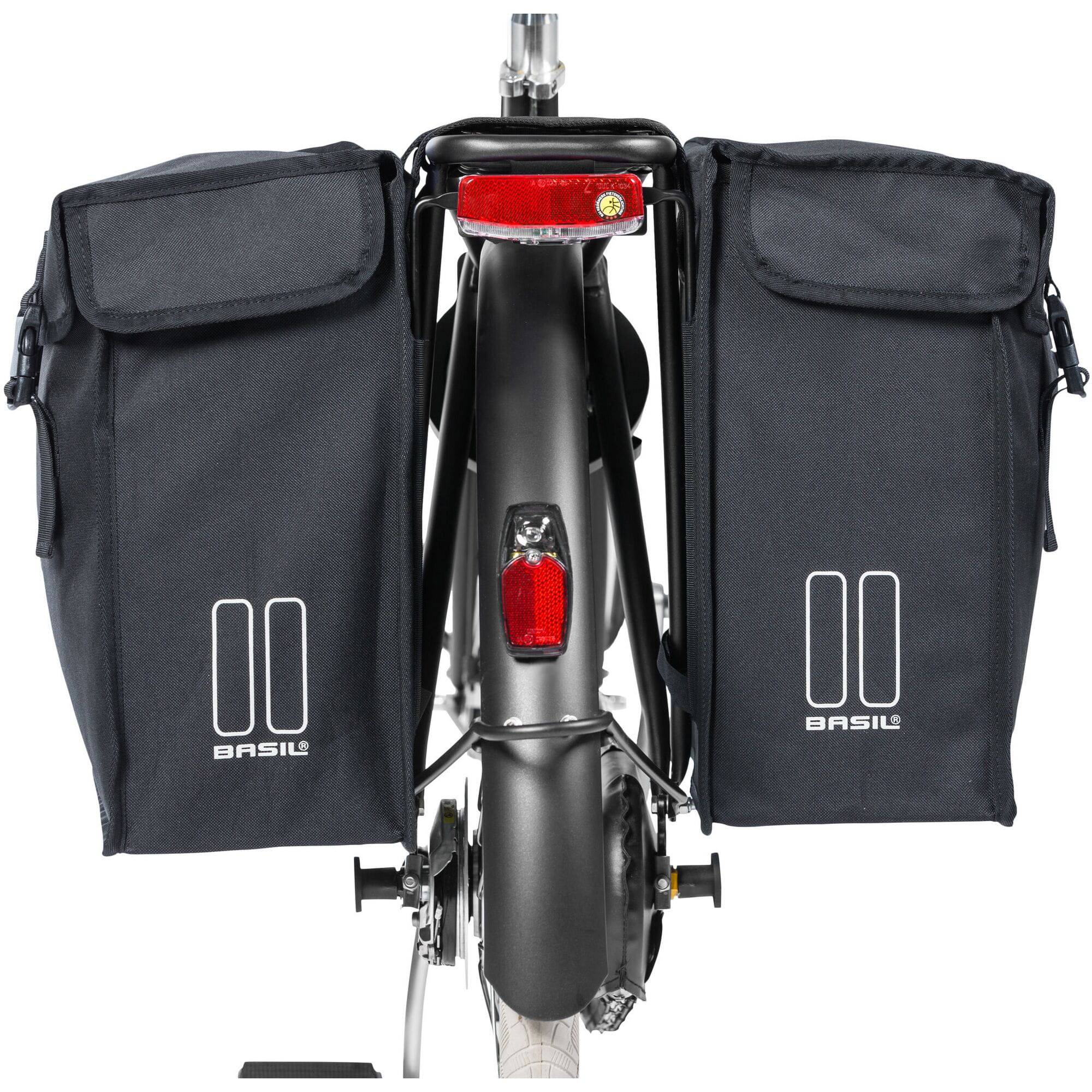 Black Basil distance holder for double panniers with rear light mount, accessory for bicycle racks.