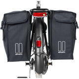Black Basil distance holder for double panniers with rear light mount, accessory for bicycle racks.