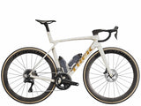 Trek Madone SLR 7 Gen 8 road bike with aero carbon frame and Shimano Ultegra Di2 shifters, sleek and lightweight design.