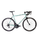 Light blue Wolfson road bike with Shimano Ultegra R8000 22-speed groupset, lightweight frame, and drop handlebars.