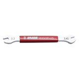 UNIOR double-sided spoke wrench with plastic-coated grip for precise wheel spoke adjustments, workshop tool for bike maintenance.