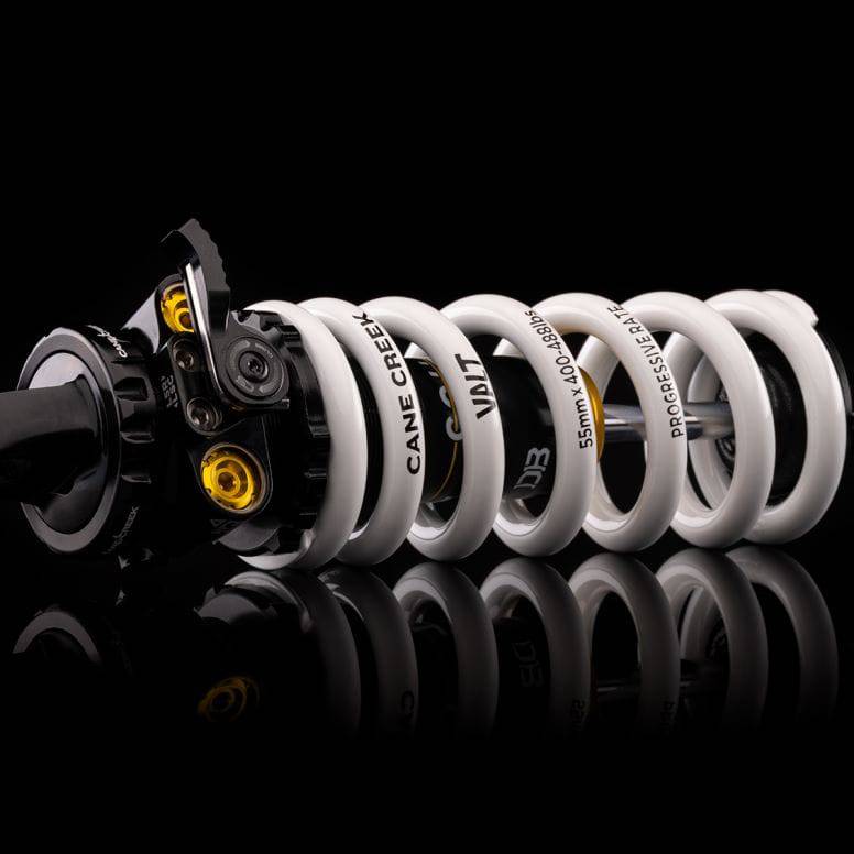 Cane Creek Dbcoil IL G2 rear shock with four-way adjustability and climb switch, bike suspension component, close-up view.