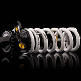 Cane Creek Dbcoil IL G2 rear shock with four-way adjustability and climb switch, bike suspension component, close-up view.