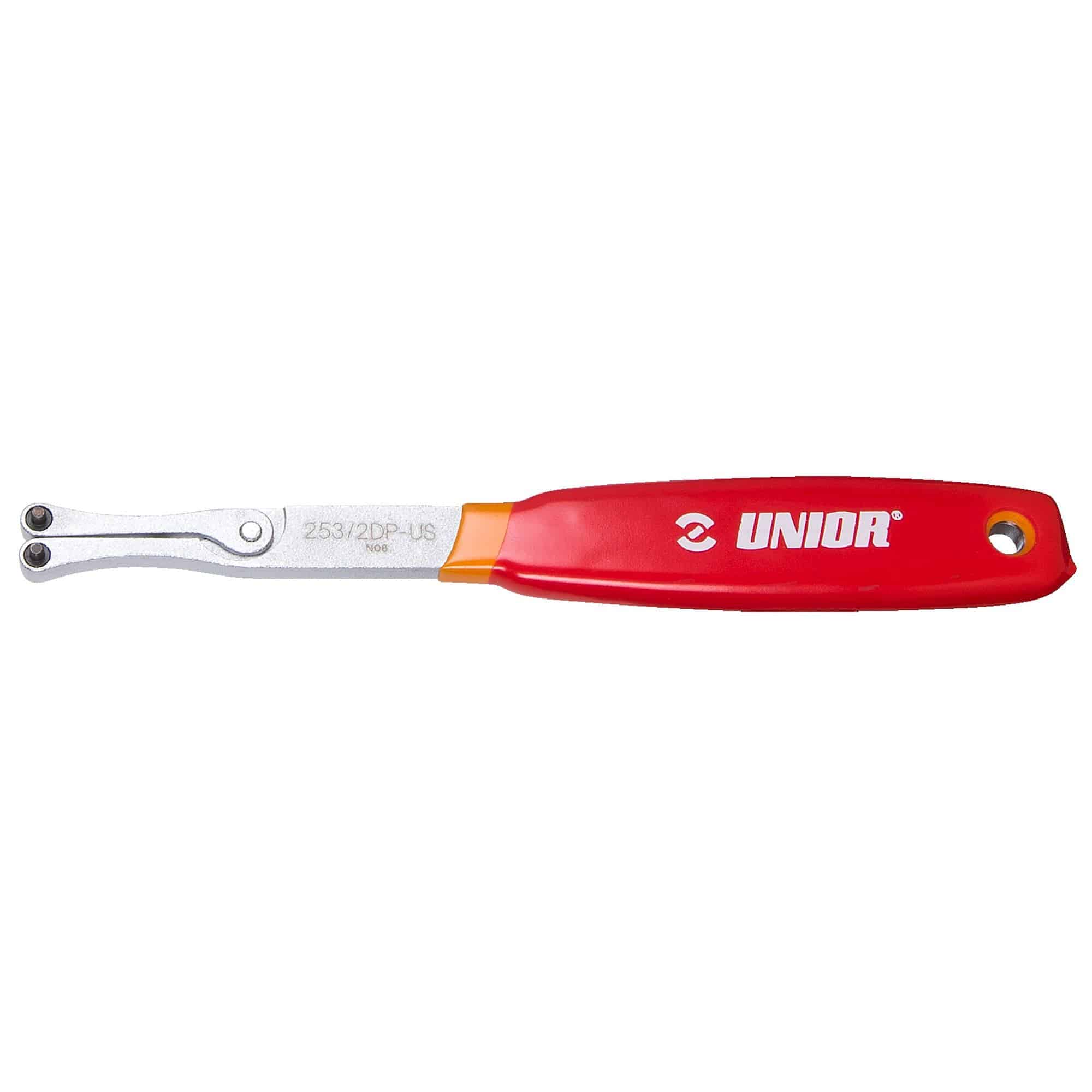 UNIOR adjustable spanner wrench with red handle, featuring interchangeable 2.3mm and 3.8mm pins for workshop use