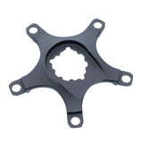 Praxis Works Direct Mount Spider 110 BCD spare part for crankset upgrade, showing the black component with mounting holes.