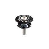 Ritchey Comp Steel headset starnut and black cap for 1-1/8-inch steel steerers, showing assembled components on a bike fork.