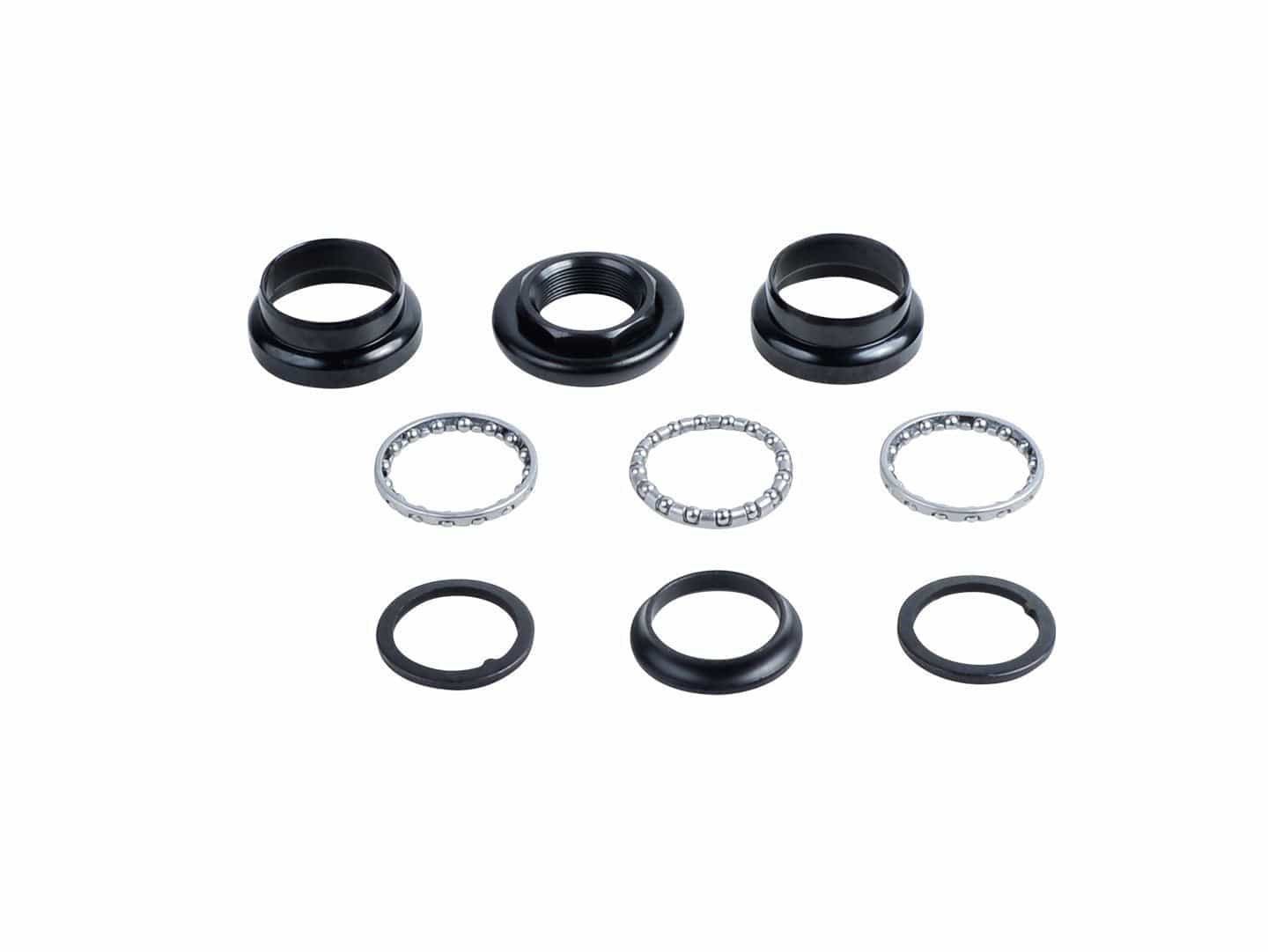 Trek Kids' headset reducer adapter in black, 1-1/8" to 1" threaded steerer, compatible with bicycle components.