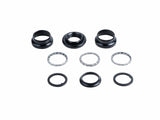 Trek Kids' headset reducer adapter in black, 1-1/8" to 1" threaded steerer, compatible with bicycle components.