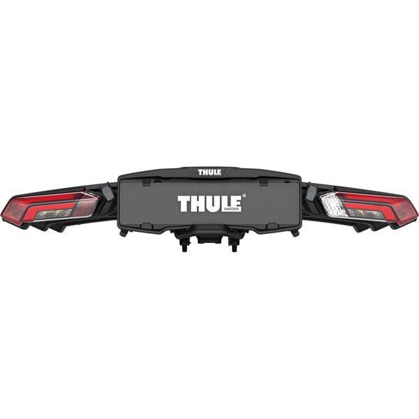 Thule Epos 3-bike towball carrier with 13-pin connector, shown mounted on a vehicle for secure bike transport.