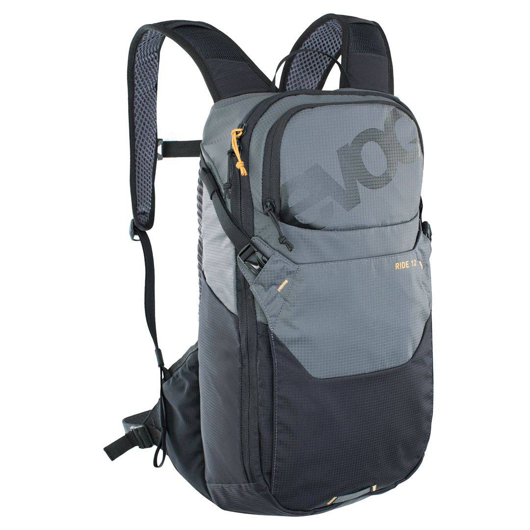 EVOC Ride Performance 12L cycling backpack with hydration system and helmet flap, shown with straps and reflective details.
