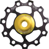SunRace CNC 11T jockey wheel for rear derailleur, bike component for smooth shifting, shown in close-up with metal finish.