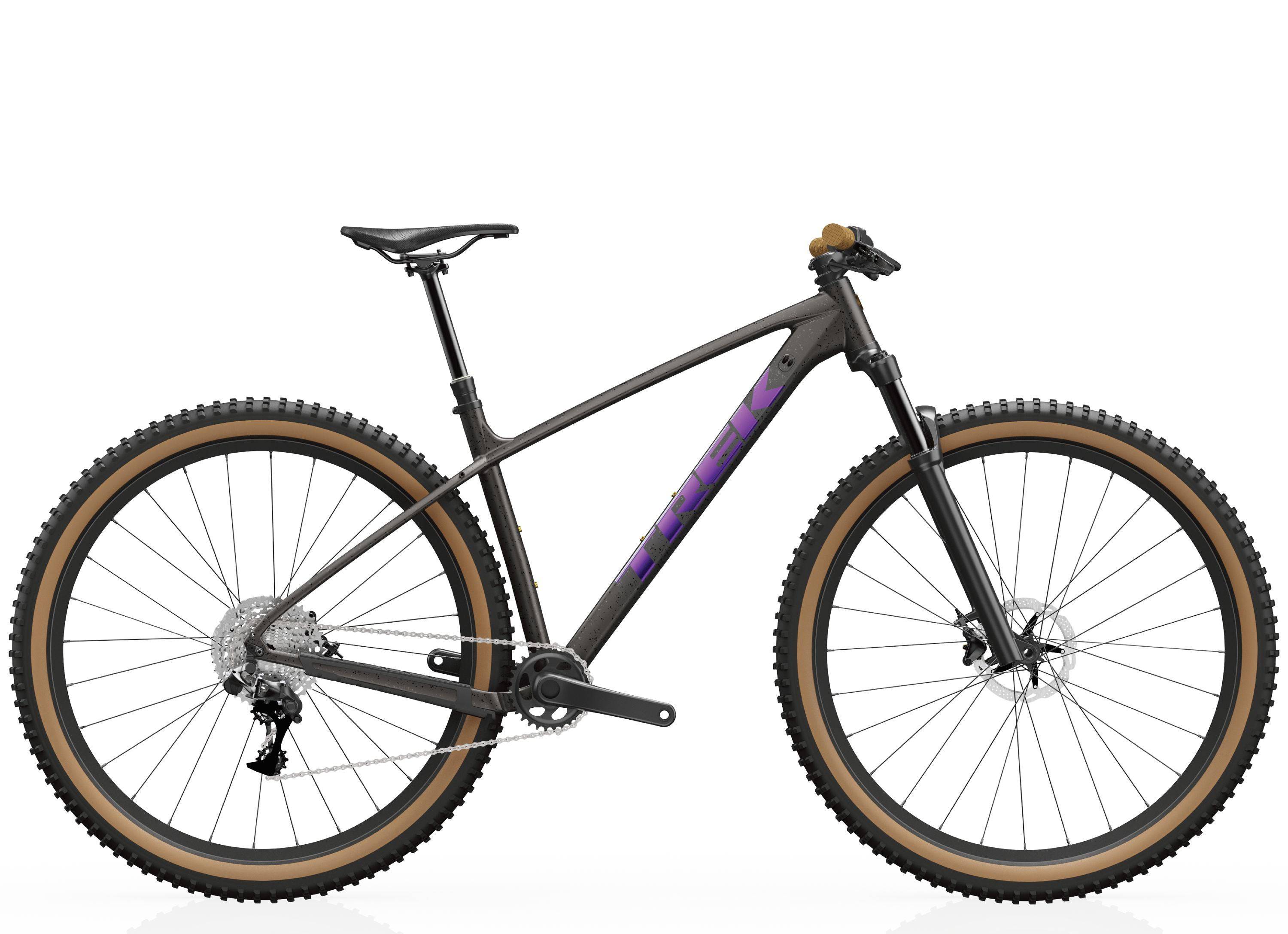 Trek Marlin 7 Gen 3 mountain bike with lightweight frame, knobby tires, and front suspension, ideal for trail riding.