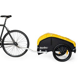 Burley Nomad cargo bike trailer with water-resistant cover and foldable design, showing its sleek, durable exterior and compact fold.