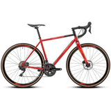 Genesis Equilibrium Disc Road Bike with Shimano 105 R7000 gears and rack mounts, shown with sleek frame and drop handlebars.