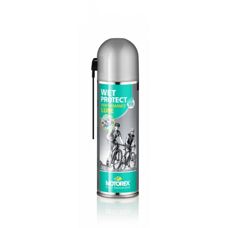 Motorex Wet Protect Spray bicycle chain lubricant in silver and green, biodegradable for wet riding conditions.