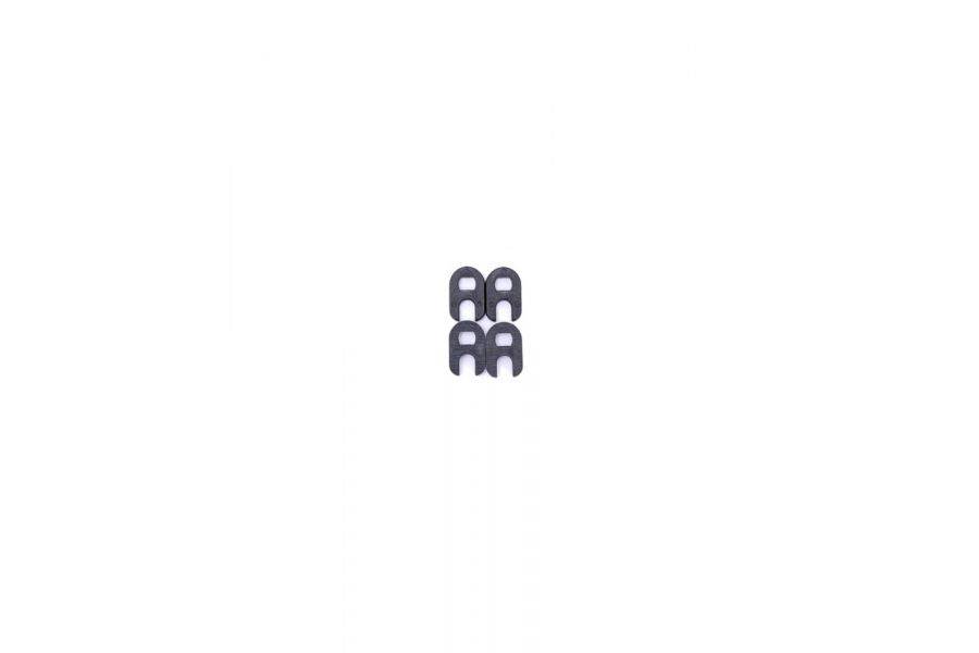 Orange Seal RVC tools 4-pack in black for tubeless valve refills and maintenance, featuring compact components for bike tire care.