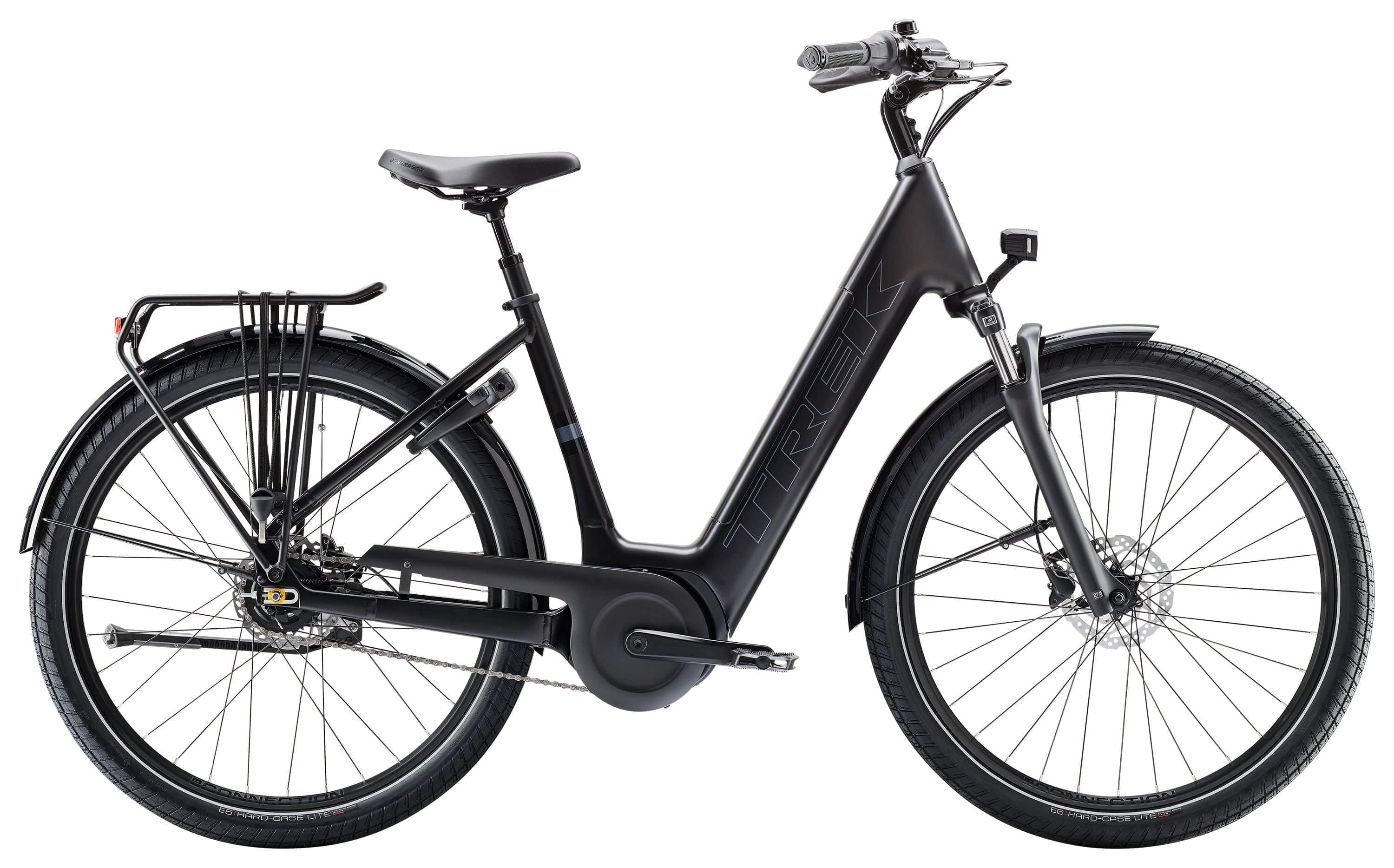 Trek District+ 4 Coaster Lowstep electric hybrid bike for women with Bosch motor, featuring a sleek frame and comfortable saddle.