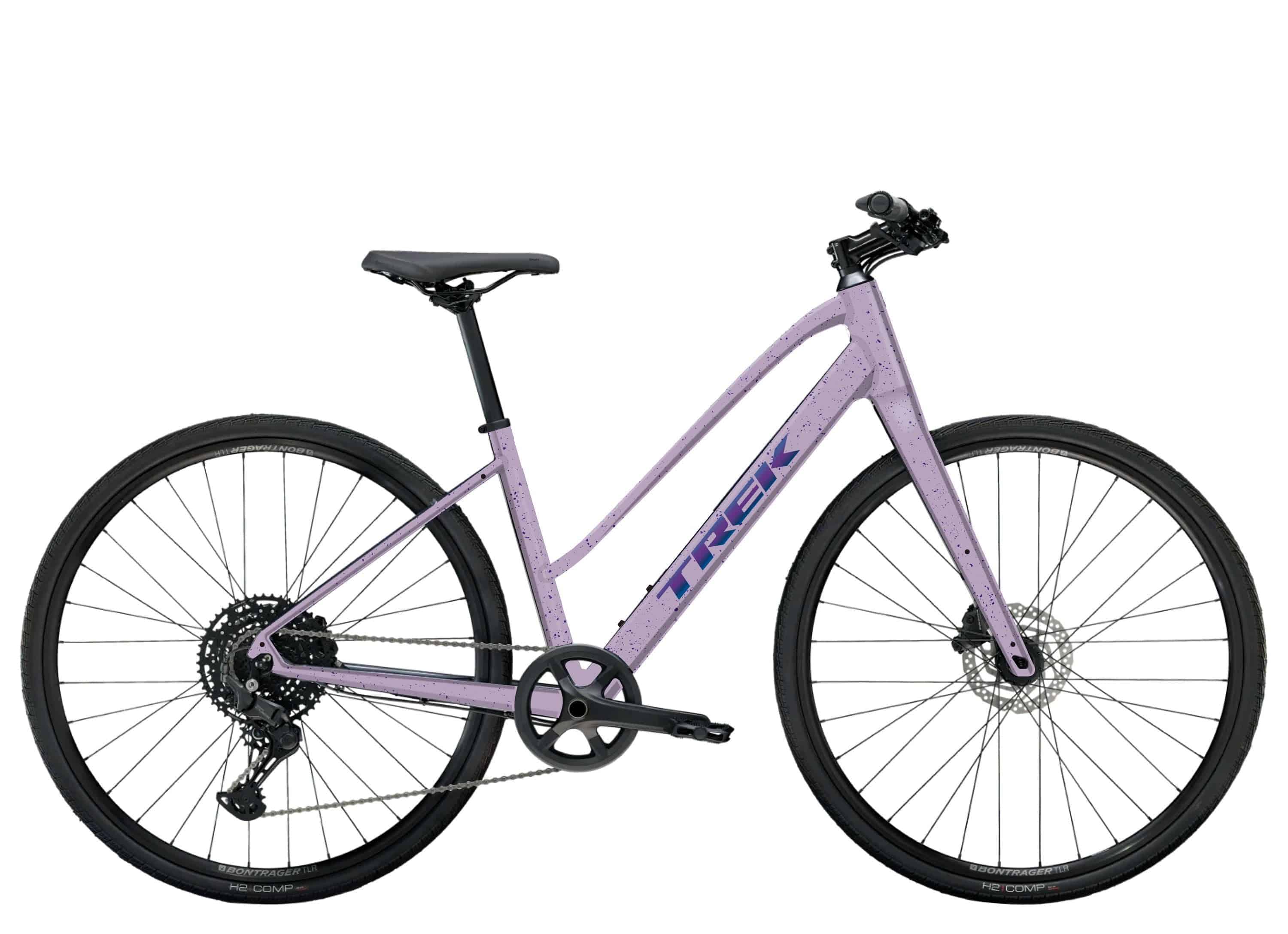 Trek FX 1 Midstep Gen 4 hybrid bike with comfortable frame, suitable for urban and trail commuting, shown in a city setting