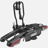 Thule EasyFold 3 tow bar bike rack with AcuTight clamps holding two bikes on a 13-pin towbar accessory system.