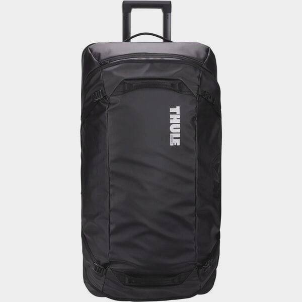 Black Thule Chasm Rolling Duffel Bag showing durable weather-resistant fabric and sturdy wheels for travel accessories.