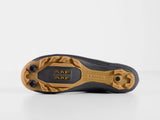 Trek Cambion unisex mountain bike shoes for trail riding, showing black and red design with rugged soles and secure fastenings.