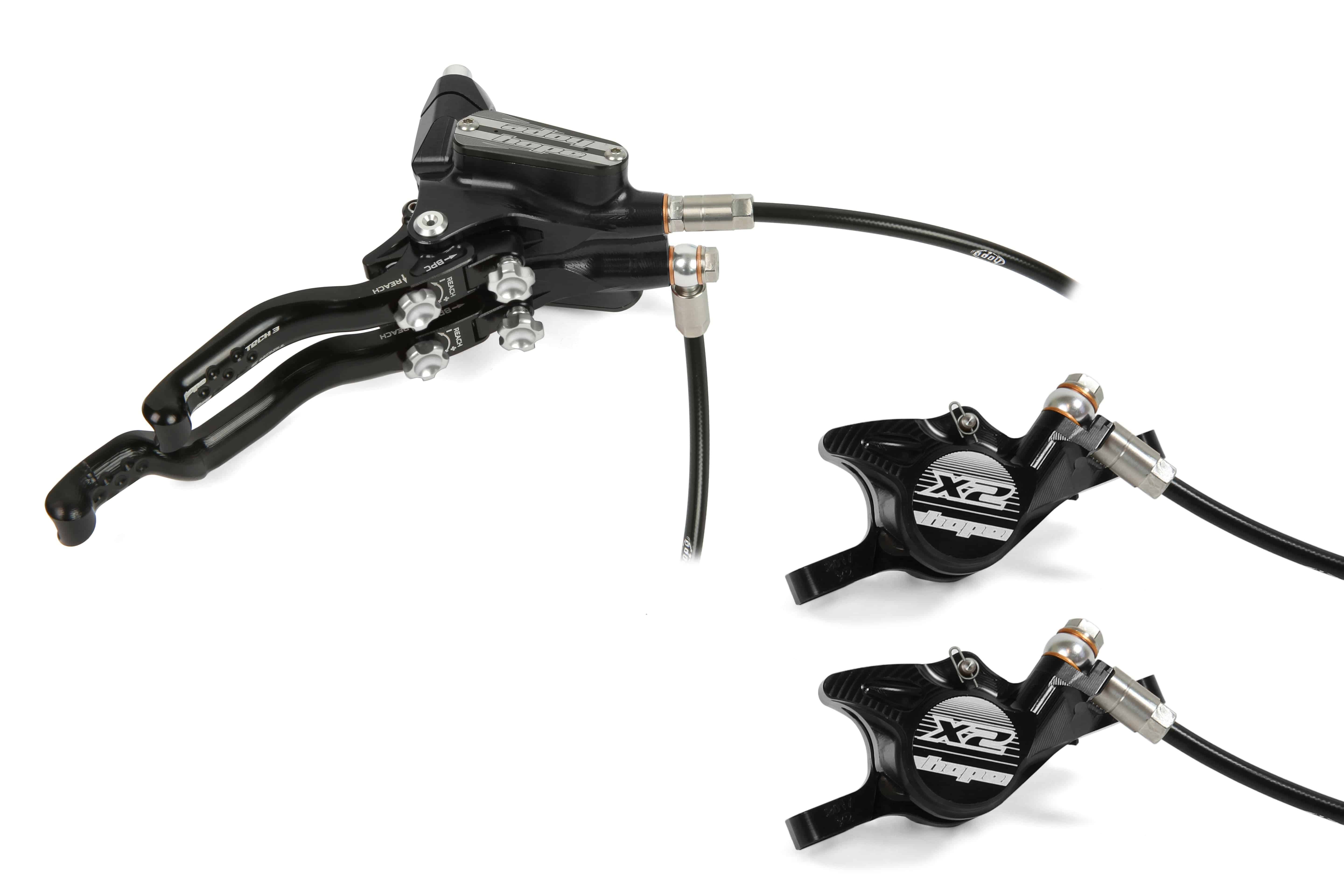 Hope Tech 3 X2 Duo brake components with adjustable levers, compatible with Shimano and SRAM cycling brakes.