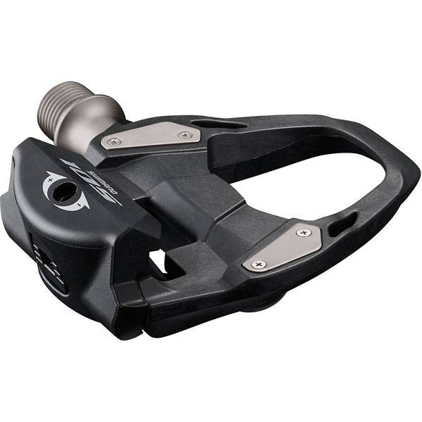 Shimano 105 PD-R7000 SPD-SL road pedals in black with carbon body for 11-speed road bike components.