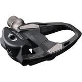 Shimano 105 PD-R7000 SPD-SL road pedals in black with carbon body for 11-speed road bike components.