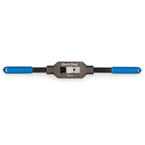 Park Tool TH-2 large tap handle for metric M4-M12 and standard taps up to 9/16 inch, used in workshop tool setup.